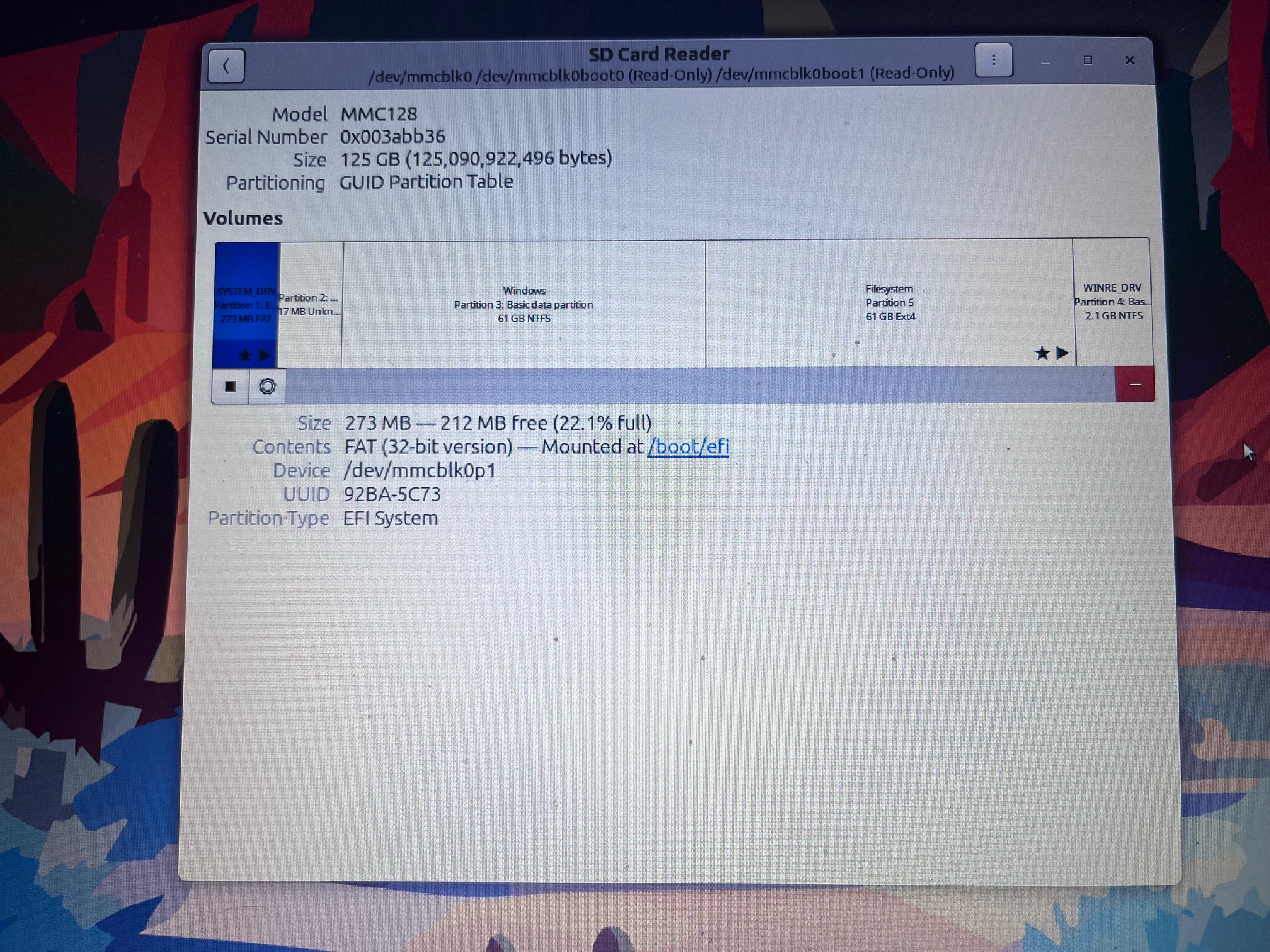 Disks view of the original, undisturbed eMMC drive (128GB, split into a Windows 11 and Ubuntu 24.04 LTS partitions